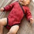Glueckskind_wickelbody_himbeere_geisslein_merinowolle_Seide.webp